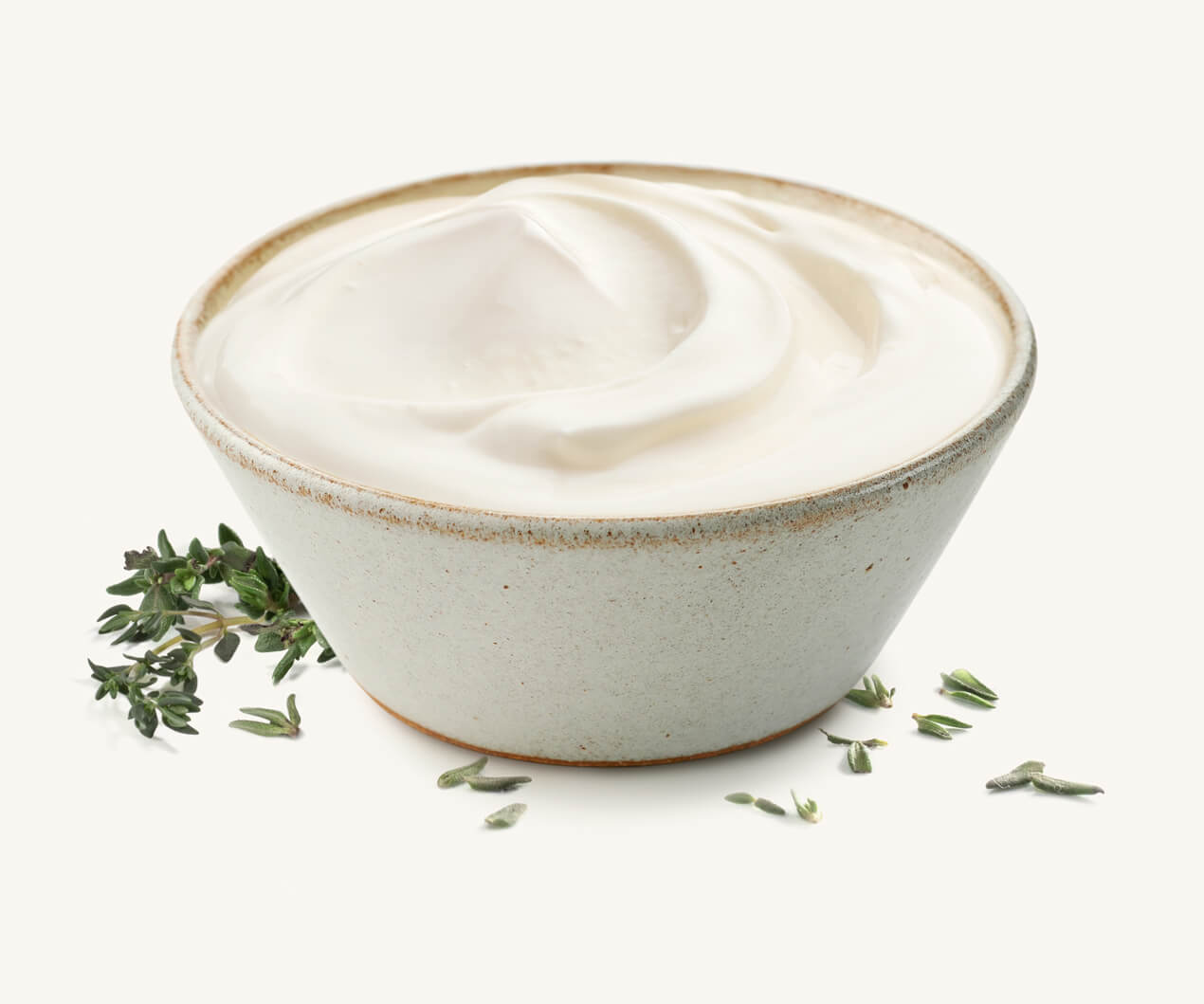 Pote de queso untable clásico, acompañado de tomillo fresco